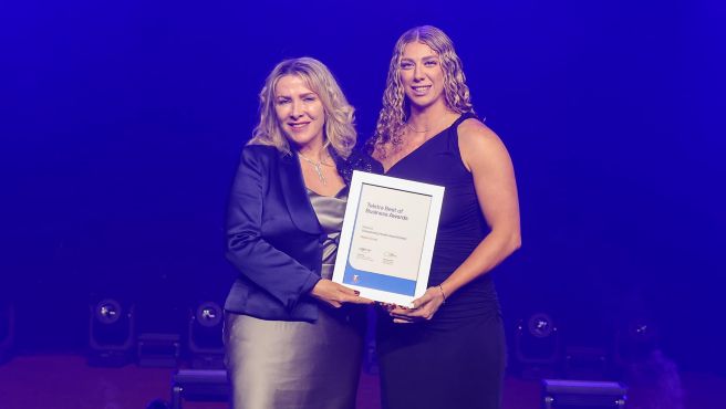 Tracey Seipel accepting award for Seipel Group as the 2024 Winner Telstra Queensland Championing Health